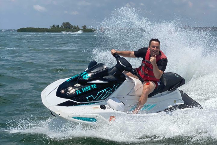 a man riding a wave on a surfboard in the water